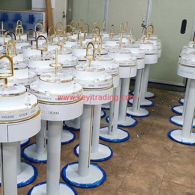 Makeup Shop Floor Standing Rotating Cosmetics Display Rack With Drawer